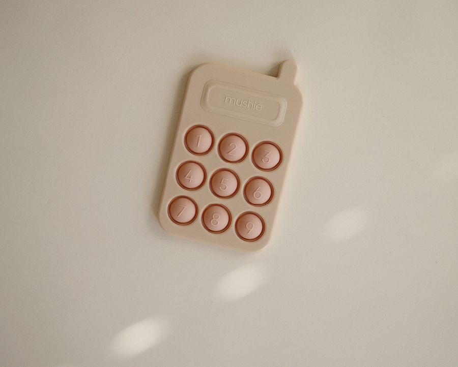 Pop it & press toy Mushie Press toy phone