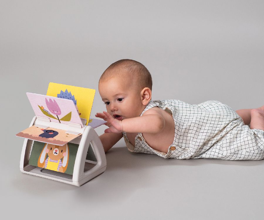 Activiteitendriehoek Taf Toys Tummy-Time Spinning Book