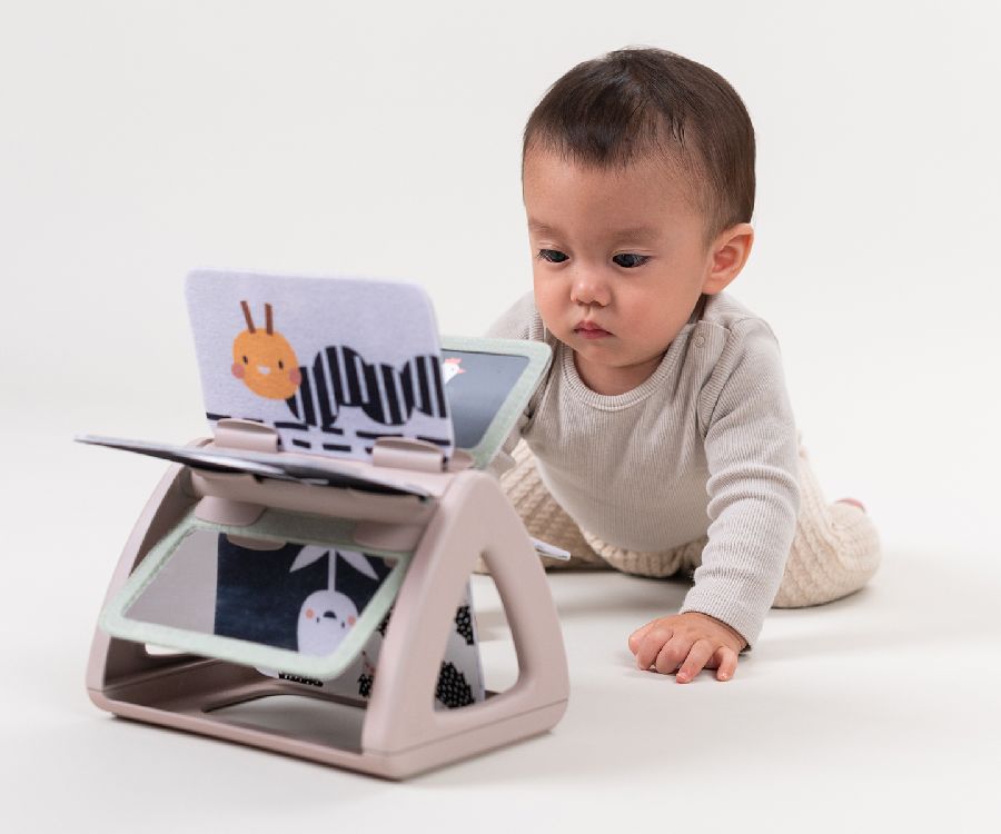Activiteitendriehoek Taf Toys Tummy-Time Spinning Book